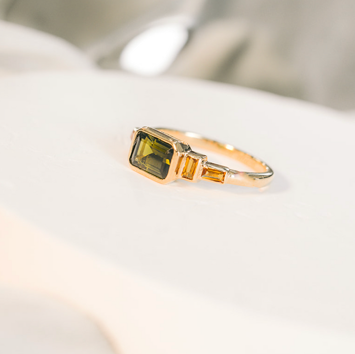 Gouden ring met baguette citrienen en toermalijn