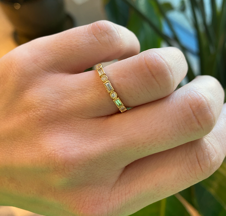 Trouwring met ronde en baguette diamanten