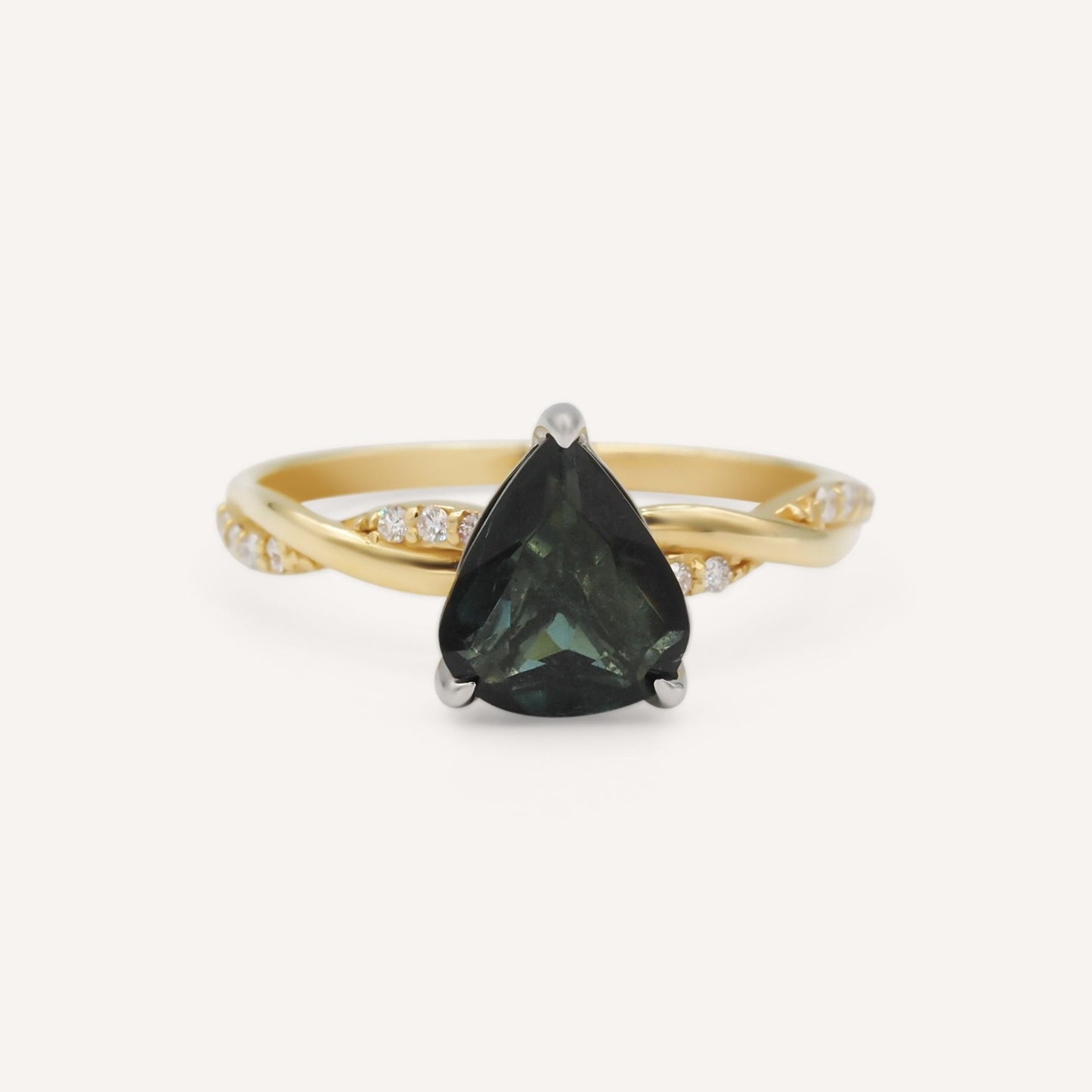 Green sapphire diamonds ring