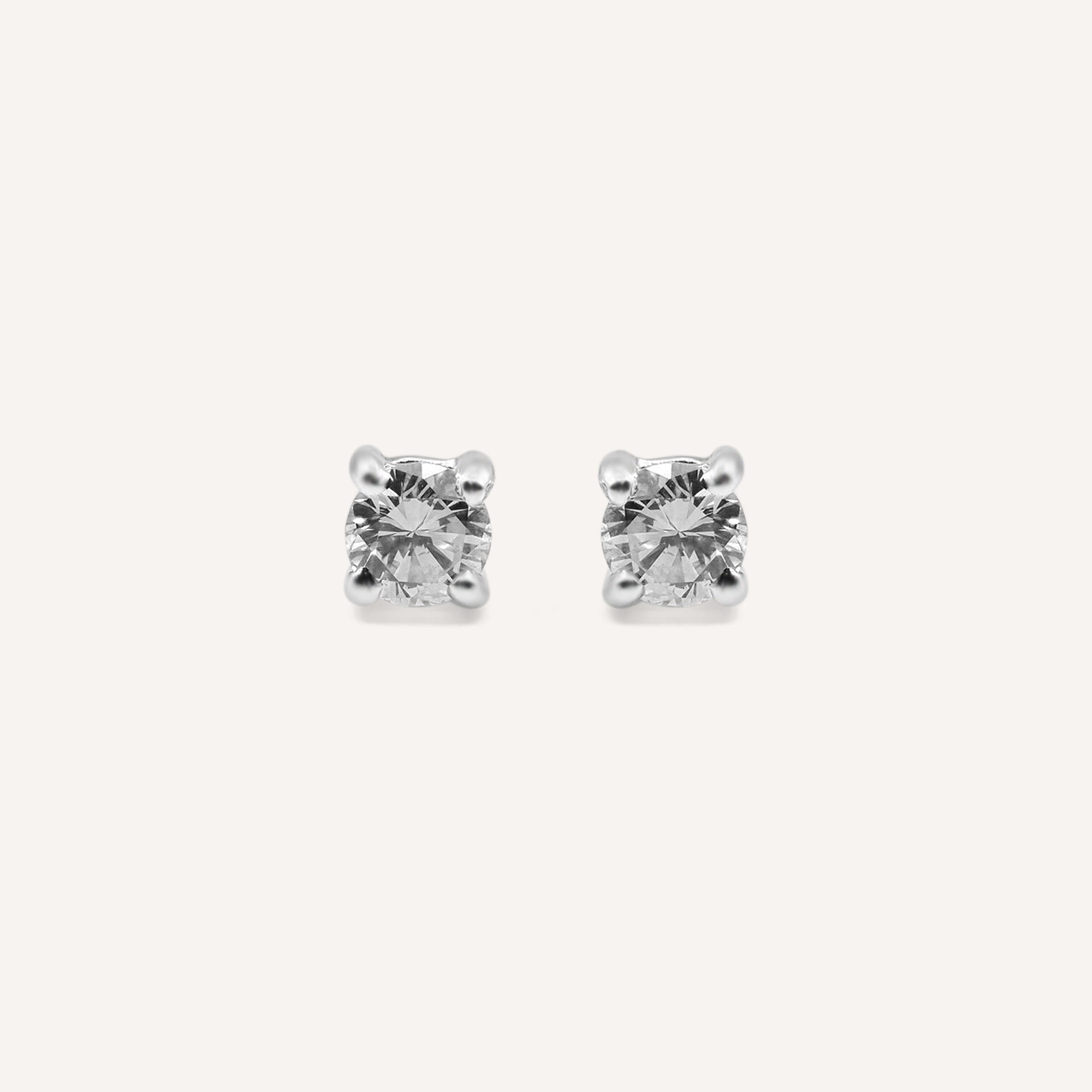 White solitaire earrings