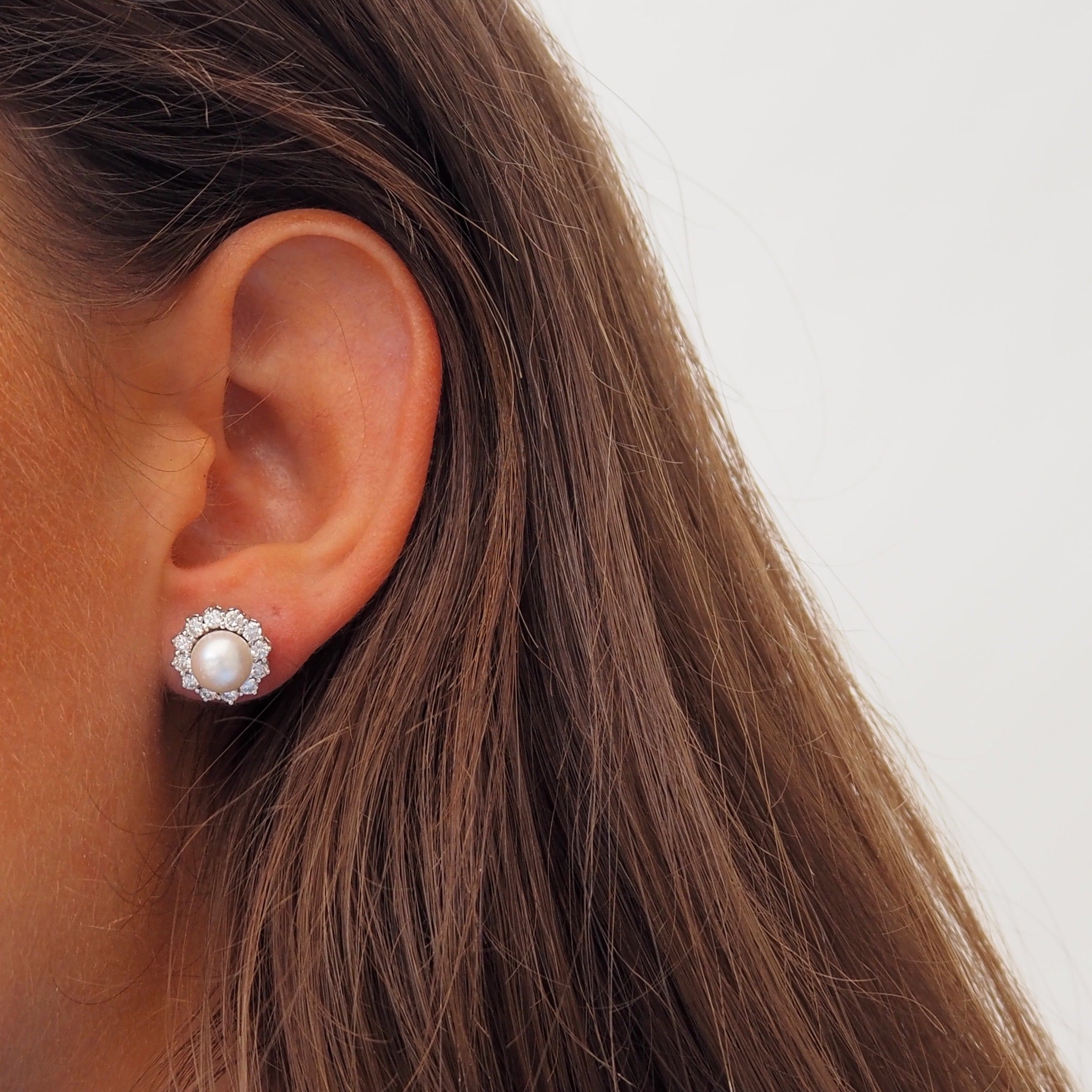 Oorbellen met parels en diamanten