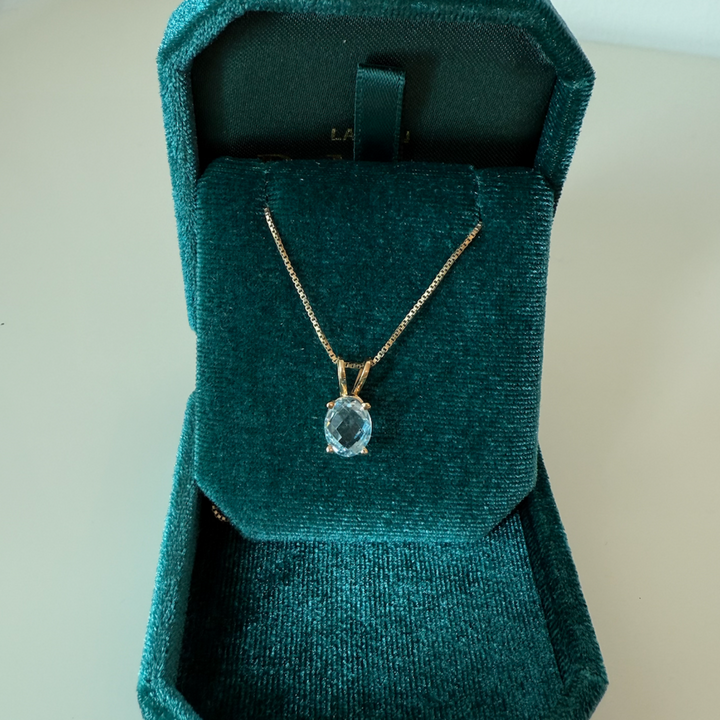 Hanger met topaas 18 karaat goud de maere knokke