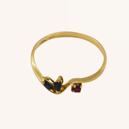 Golden ring with ruby and sapphires